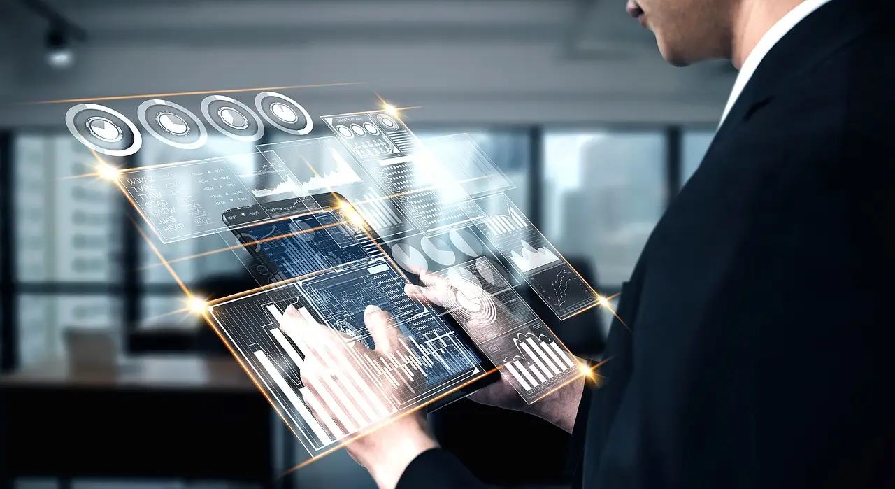 A business professional interacts with a futuristic AI-powered analytics interface featuring holographic charts, graphs, and data visualizations in a modern office setting.