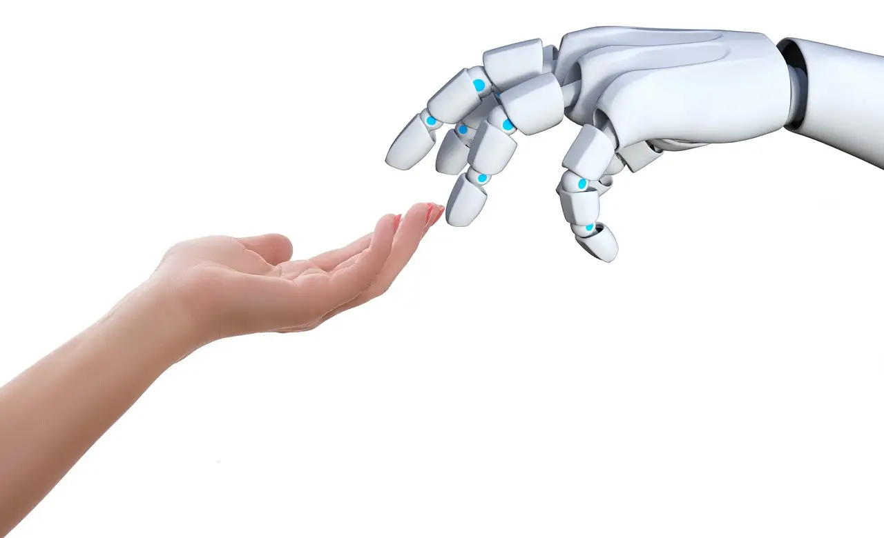 A robotic hand and a human hand reaching out to touch each other, symbolizing the connection between humans and robotics trends.