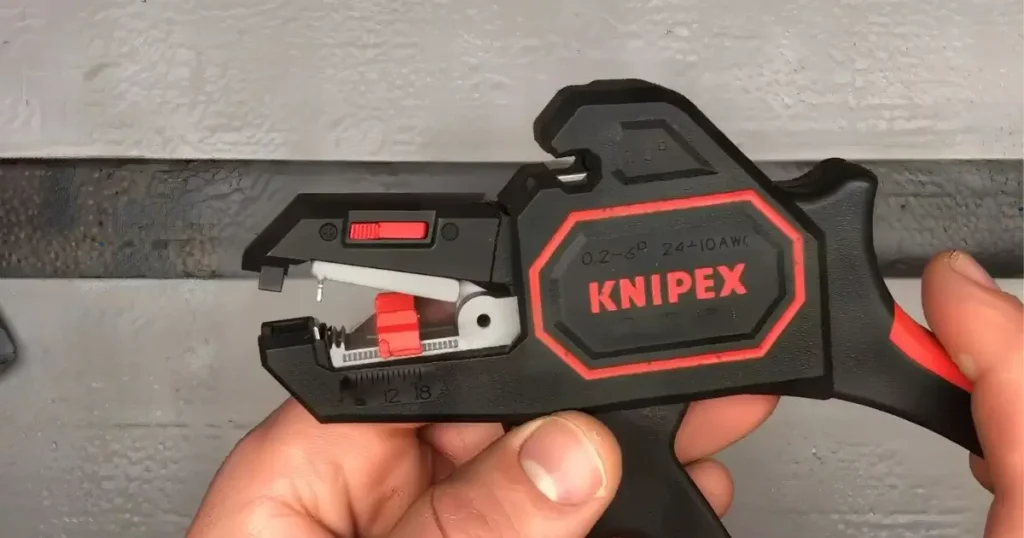 Close-up of KNIPEX 1262180 Wire Stripper - Showing Adjustment Dial and Sharp Blades
