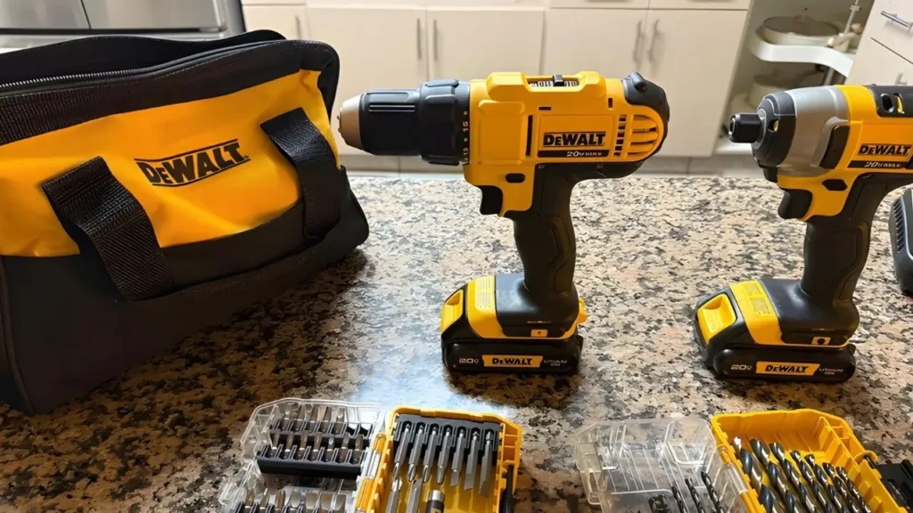 DEWALT DCK240C2 Review Smart AI Gears - Drill and impact driver kit with accessories on a table.