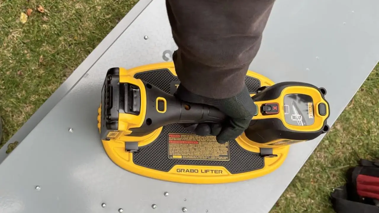 DeWalt Grabo Lifter Review Smart AI Gears lifting metal sheet