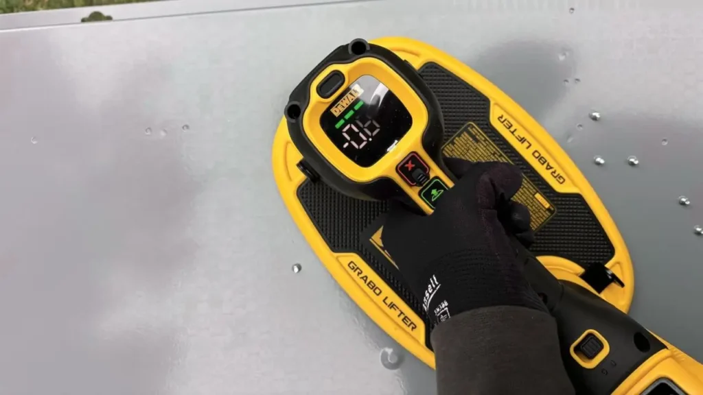 DeWalt Grabo Lifter screen and control buttons showing numbers