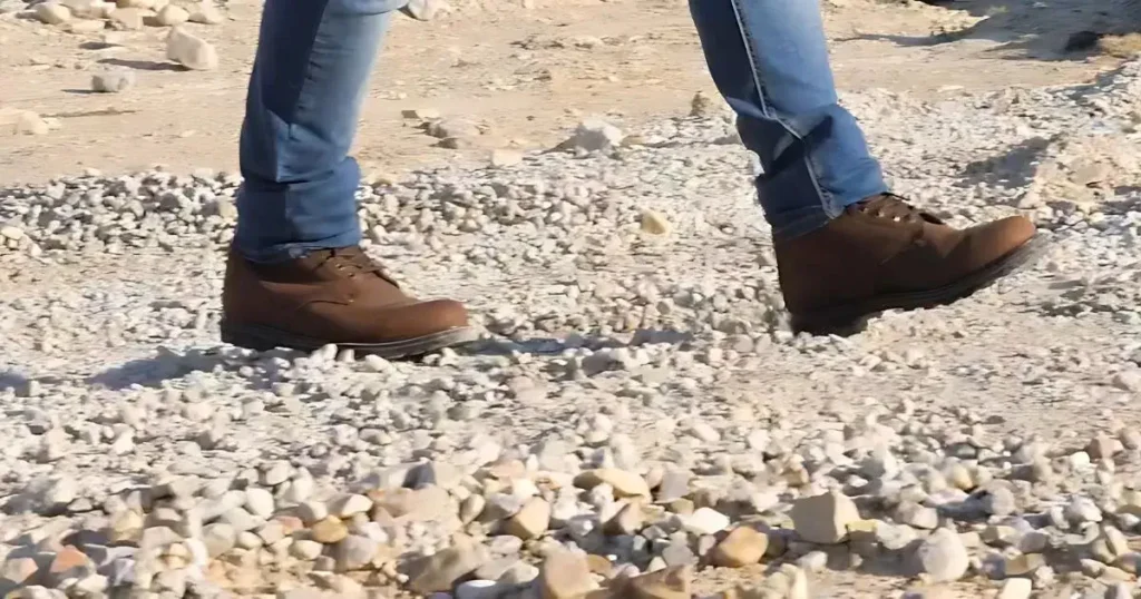 Close-up of EVER BOOTS Tank work boots in brown nubuck leather, highlighting their sturdy build and classic design for job site use.