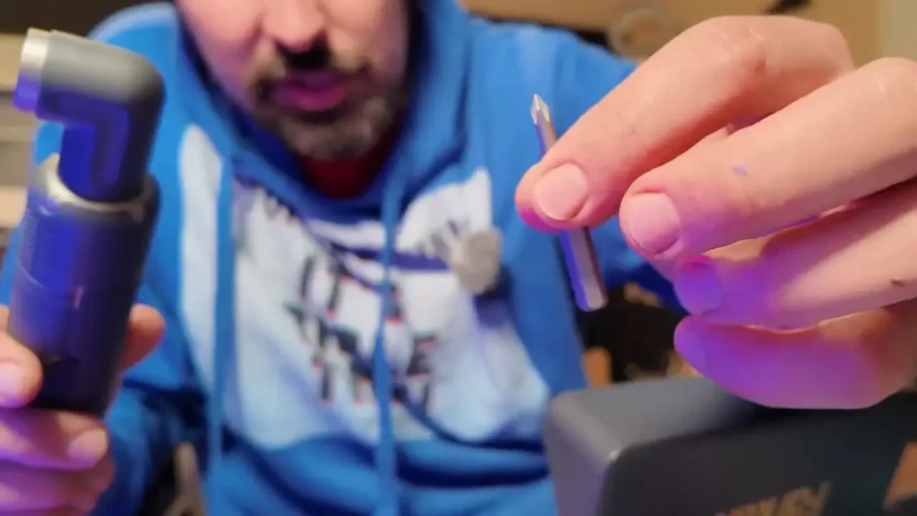 hand holding the Fanttik S2 Pro screwdriver to show its size and comfortable feel.