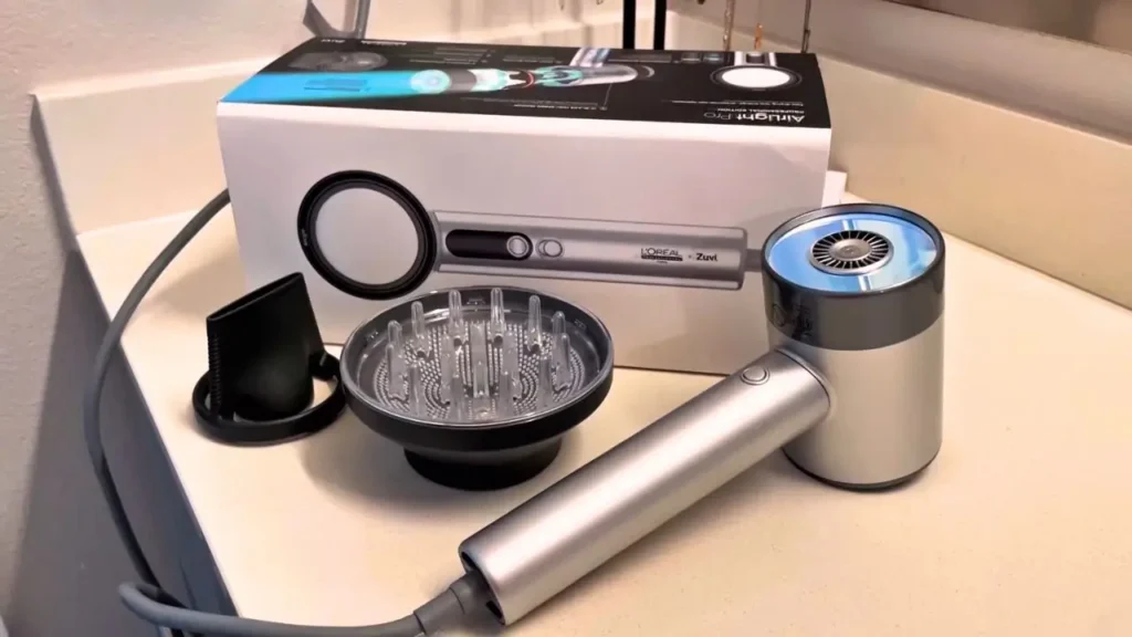 A complete L'Oréal AirLight Pro hair dryer review showing the product, box, diffuser, and concentrator on a counter | Smart AI Gears