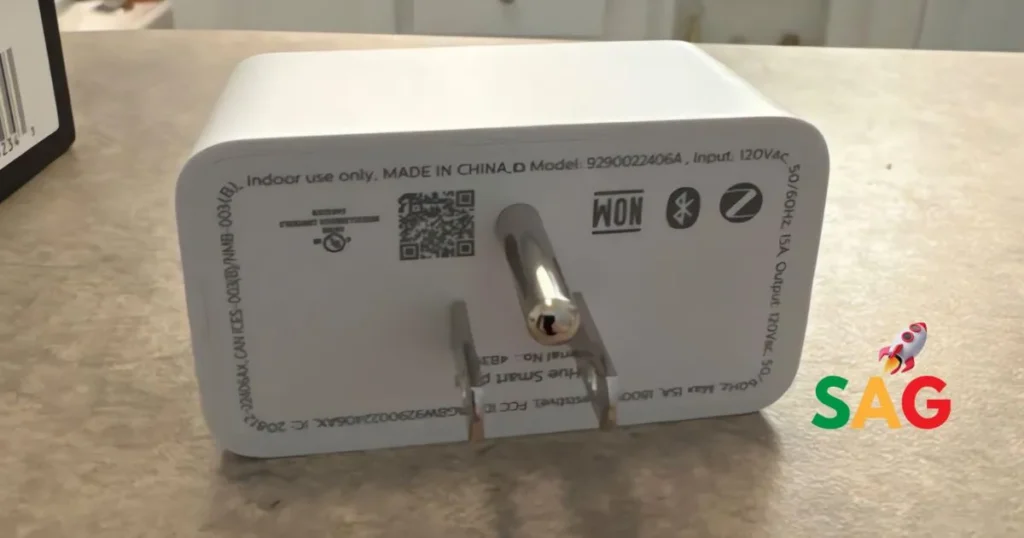 Underside of the Philips Hue Smart Plug showing model information, electrical ratings, and connectivity symbols like Bluetooth and Zigbee.
