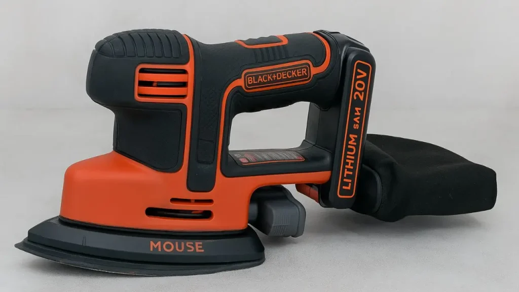 The orange and black Black+Decker 20V MAX Mouse sander, a top choice for a budget-friendly cordless sander for wood.