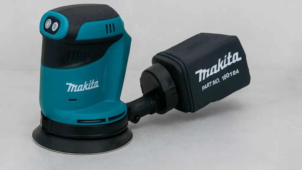 A side view of the Makita XOB01Z, a top contender for the best cordless sander for wood, showcasing its compact design.