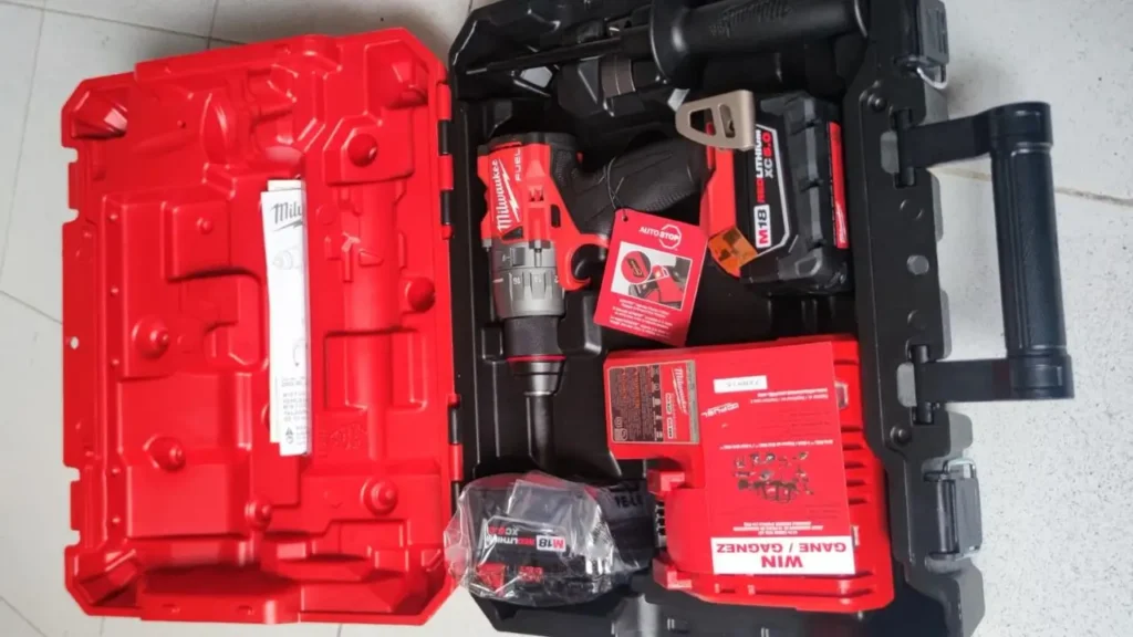 The complete Milwaukee 2904-22 M18 FUEL cordless hammer drill kit, including the tool, batteries, and charger,