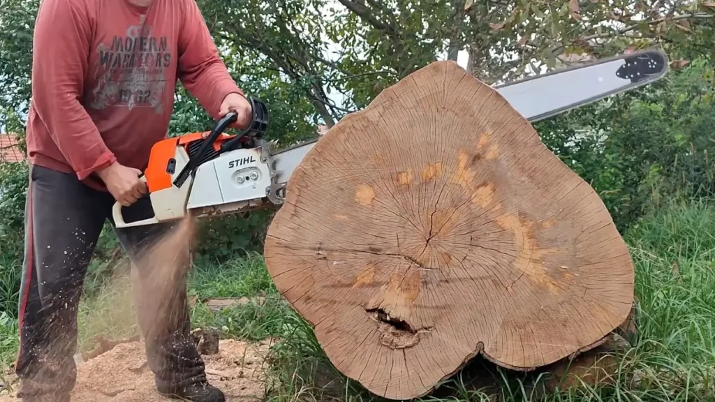 Stihl 084 Chainsaw cutting hardwood logs, showcasing its legendary power and durability in 2025. Review on Smart AI Gears