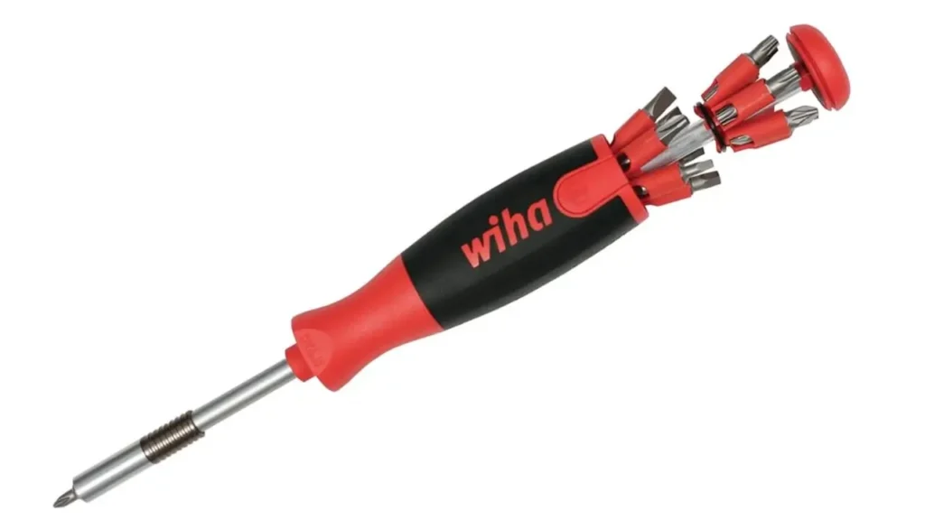 Wiha 77791 26-in-1 screwdriver with pop-up bit magazine extended from ergonomic red and black handle