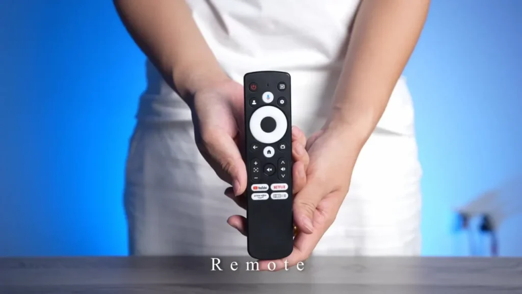 A photo of the projector's remote control, showing dedicated buttons for Netflix, YouTube, and Prime Video.