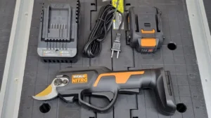 Worx Pruner WG330 review kit, showing the 20V Nitro pruner, two PowerShare batteries, and charger for Smart AI Gears.