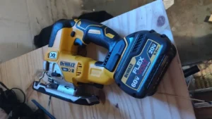 DEWALT DCS334 cordless jigsaw review by Smart AI Gears, showing the tool with a FlexVolt 60V battery attached for extended runtime on the job site.