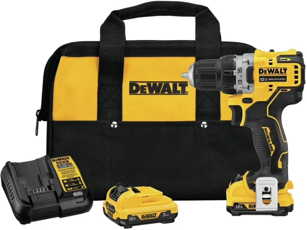 The complete DeWalt DCD701F2 12V Max drill kit, showing the compact drill, charger, and two batteries.