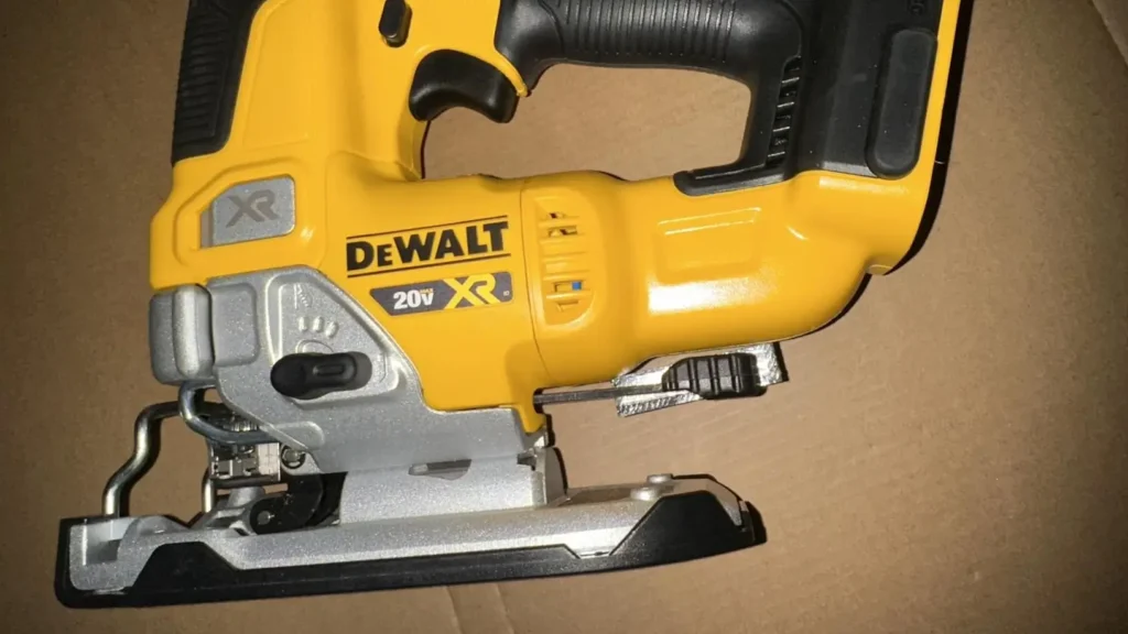 A top-down view of the DEWALT DCS334 jigsaw showcasing its sturdy composite body and soft rubber molding.
