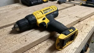 DeWalt DCD771C2 review by Smart AI Gears showing the cordless drill resting on sawdust covered wood.