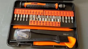 The bright yellow Jorest 40-piece precision screwdriver kit opened to show 30 CR-V steel bits. Smart AI Gears