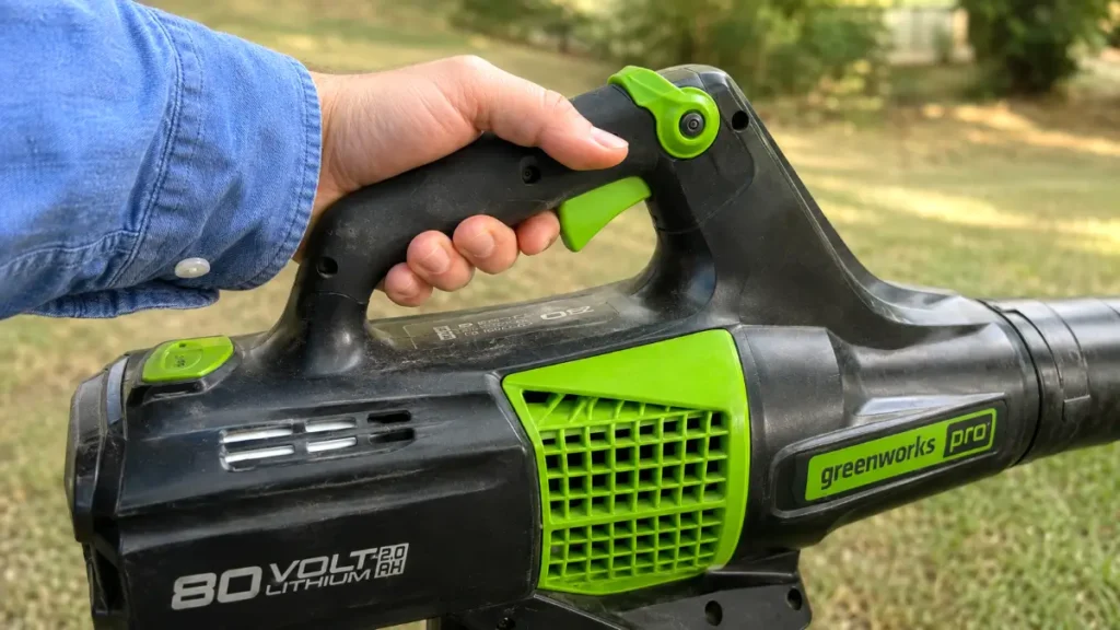 Close up of the variable speed trigger, cruise control, and turbo button on the blower handle.