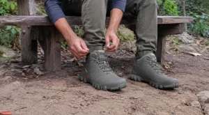 A hiker wearing the XPETI Shoes TERRA Mid Hiking Boot preparing for a trail test for Smart AI Gears.